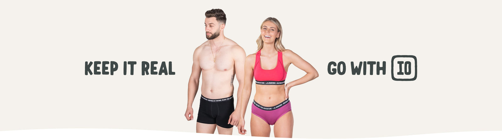 Image shows a man and woman wearing underwear. Text says 'Keep It Real' and 'Go With IO'